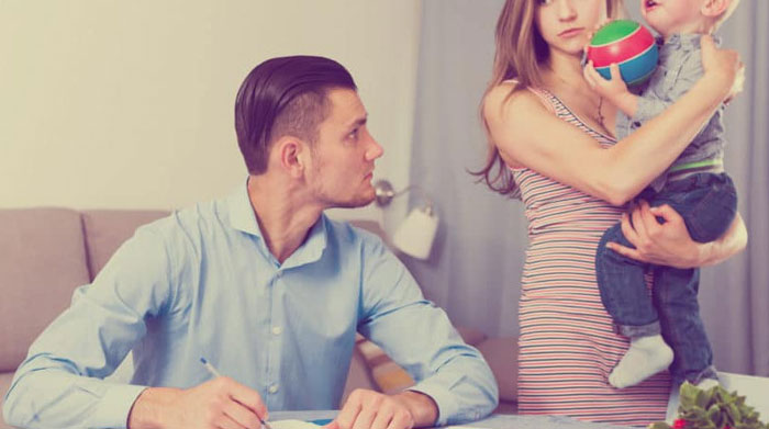 Husband staring her wife and kid