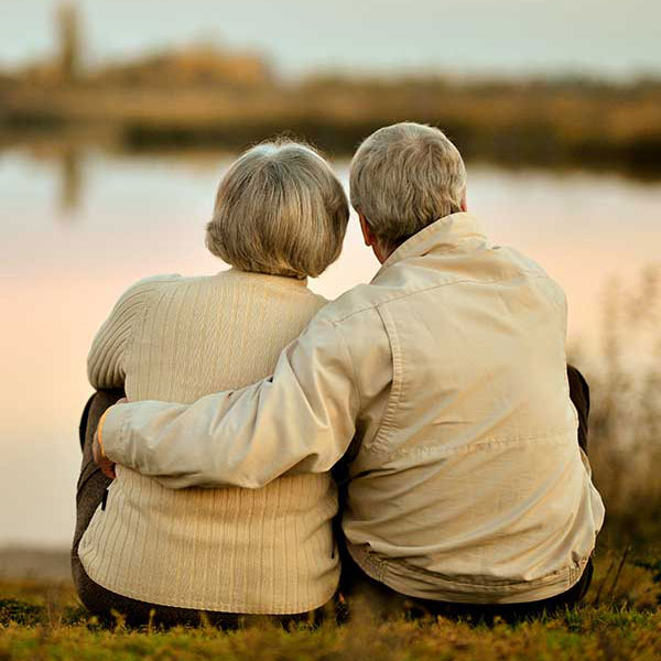 mature couple during sunset