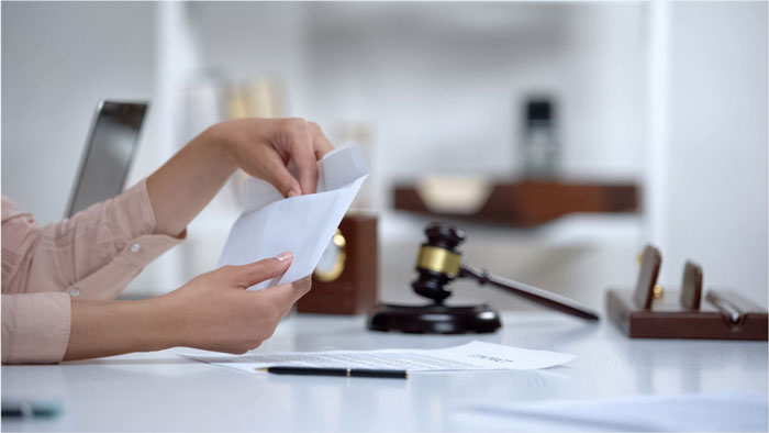 Hand Holding Envelope
